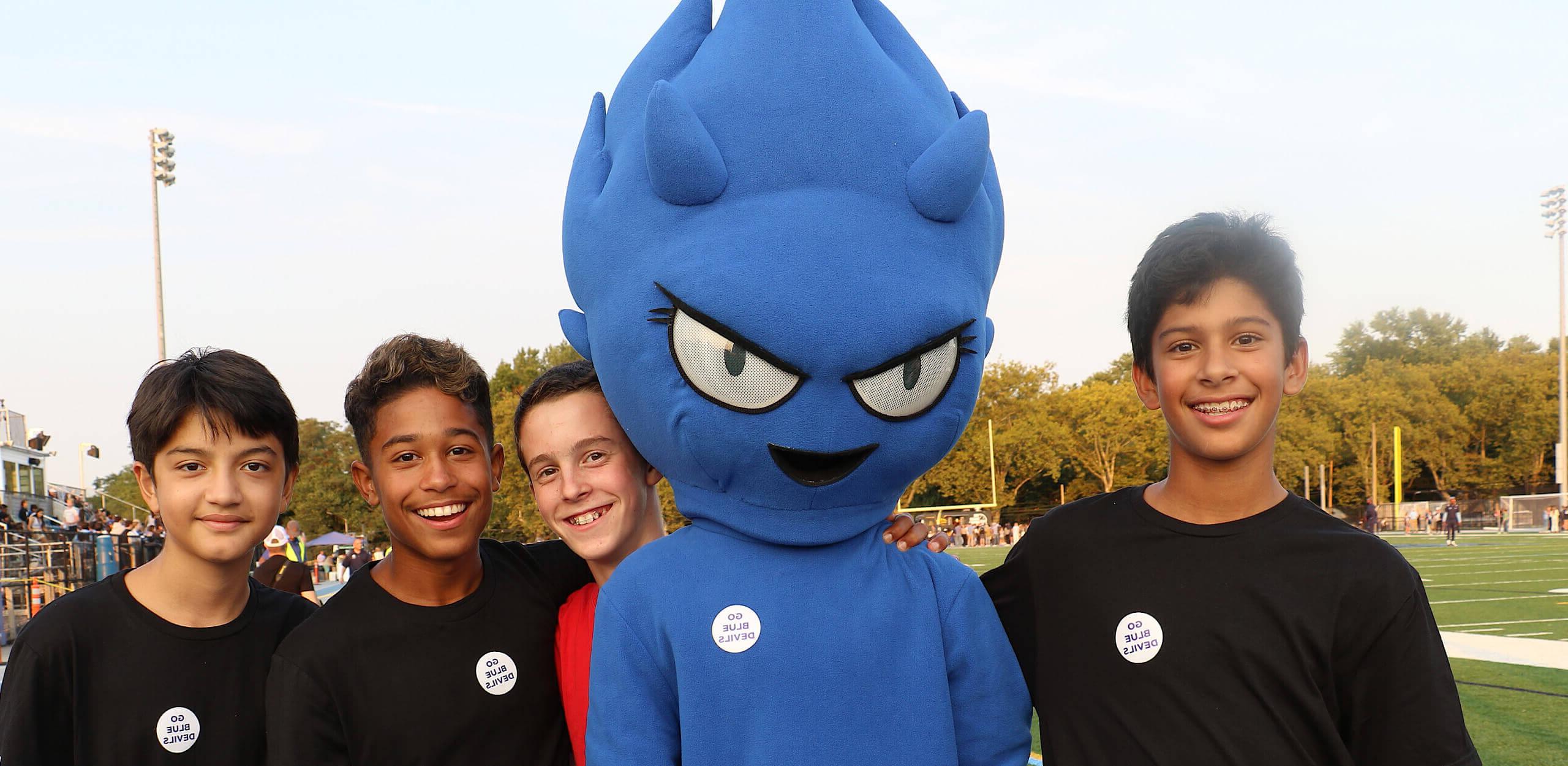 Boys with Blue Devil mascot
